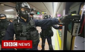 Hong Kong police storm metro system after protests - BBC News